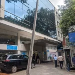 HCG Tower Building Entrance With Glass Facade